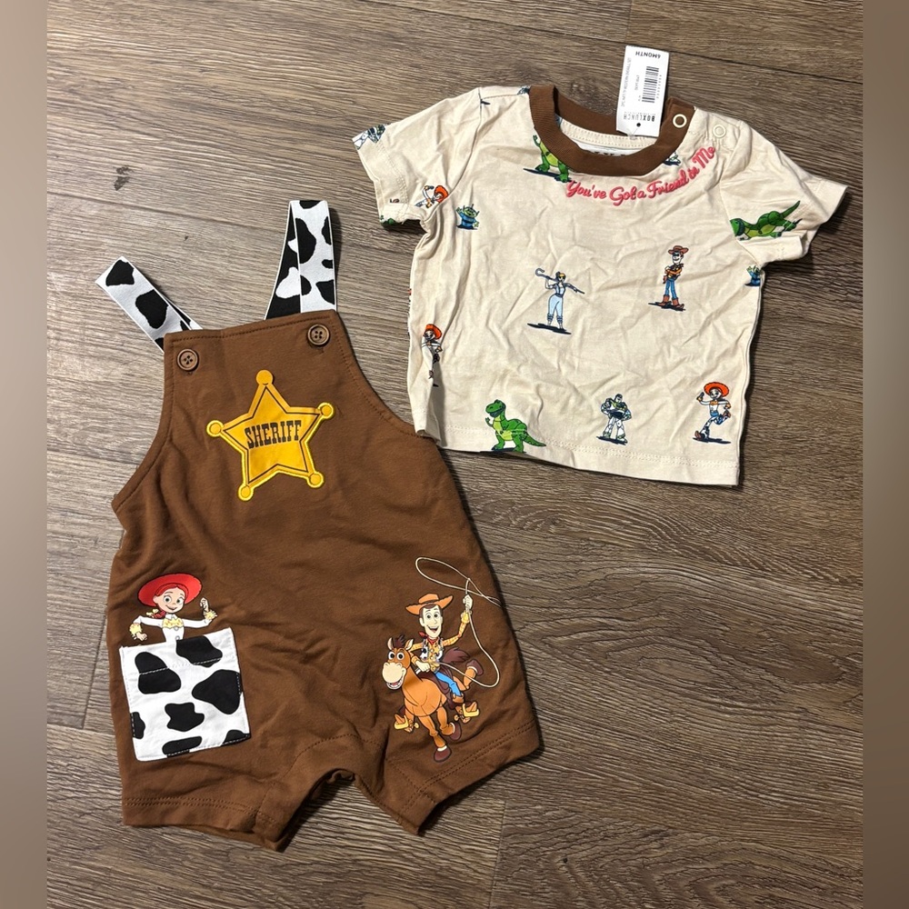 Baby 6M , Toy story overall and tee set . Boxlunch , new with tags.